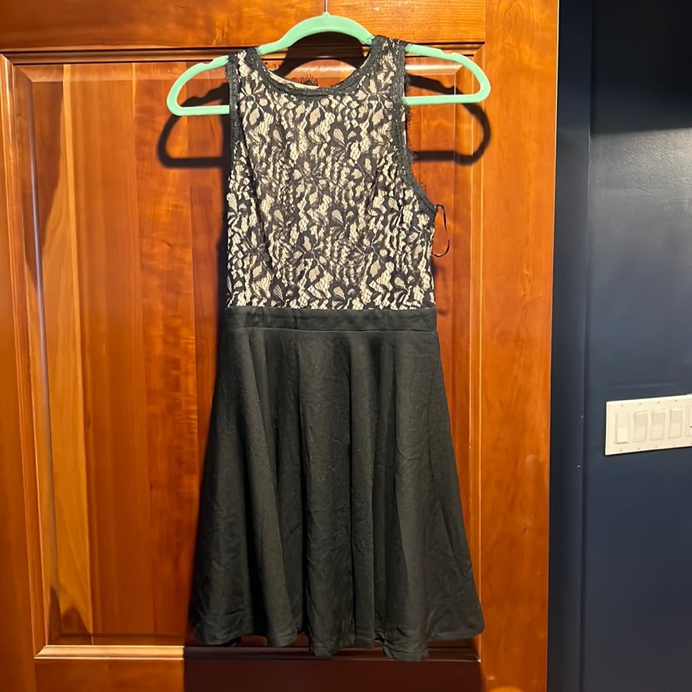 Francesca’s black dress with lace top. New with tags.